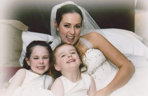 Pamela with her daughters on her wedding day